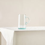 Load image into Gallery viewer, Recycled Glass Pitcher in Sea-Green designed with an Exaggerated Handle
