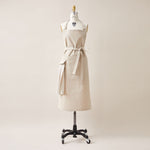 Load image into Gallery viewer, Cotton Apron in Oat Color with Handmade Decorative Stitching
