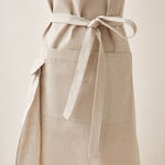 Load image into Gallery viewer, Cotton Apron in Oat Color with Handmade Decorative Stitching
